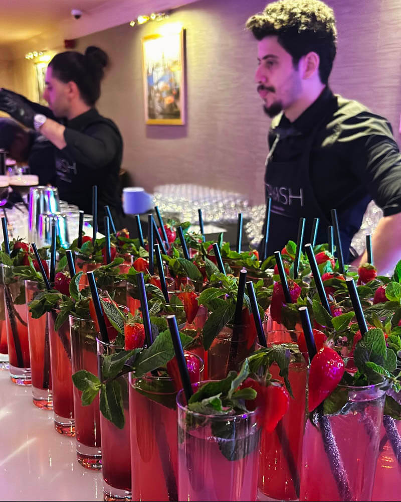Barman serving cocktails